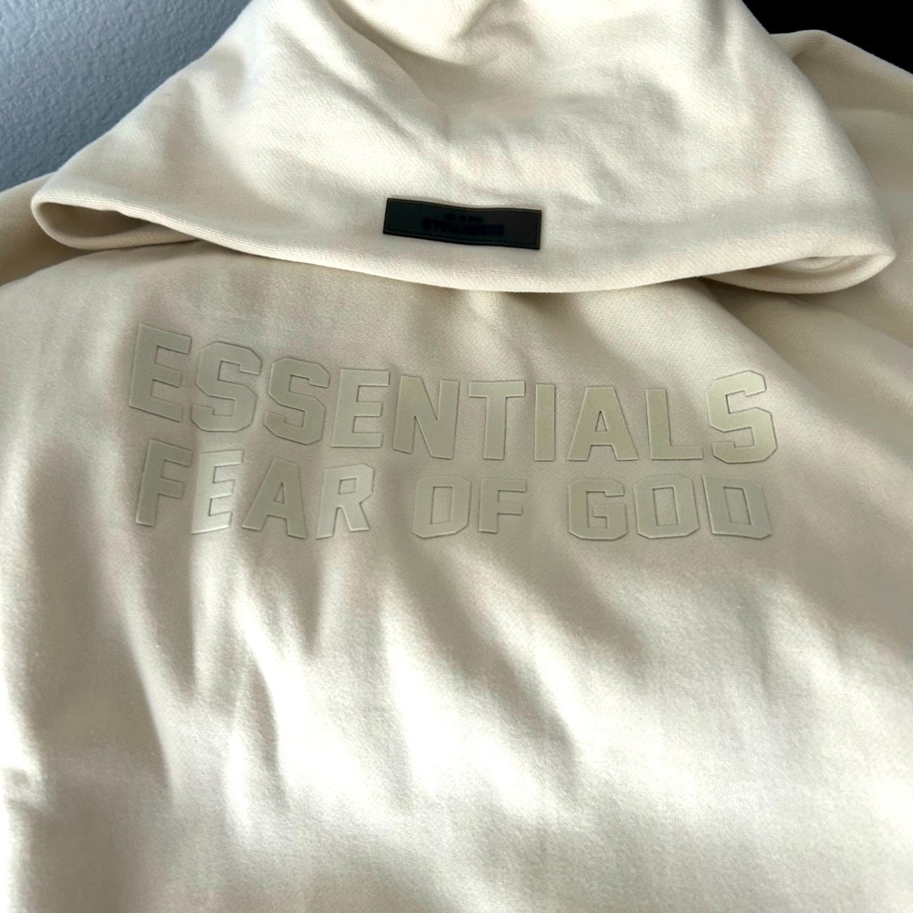 Size large hoodie and sweat pants  by Essentials price includes both.